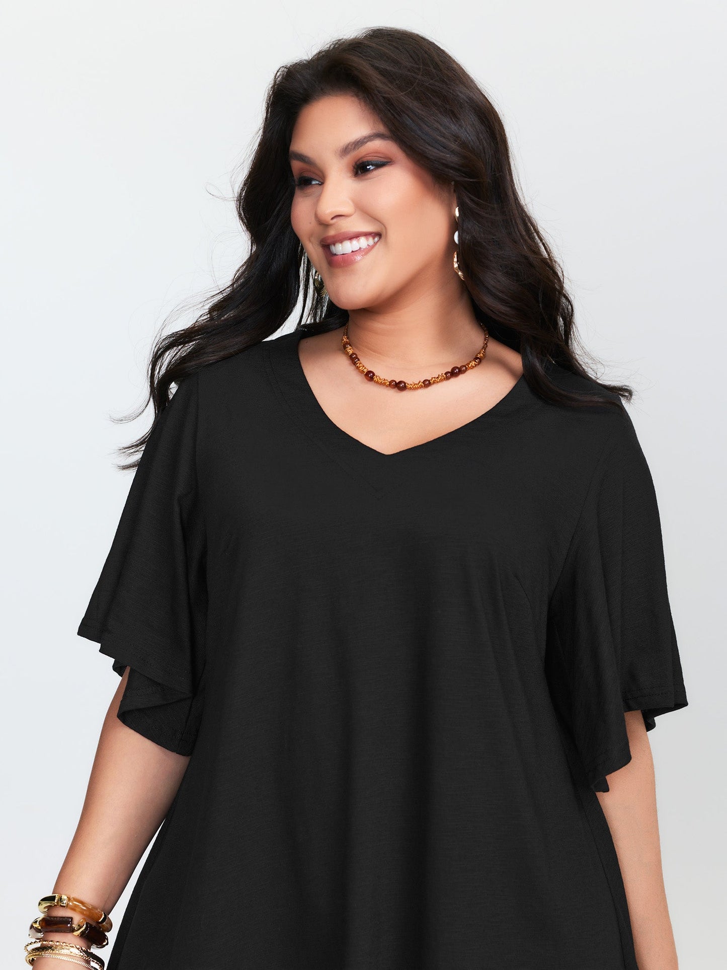 Asymmetrical Tassel Hem Plain Tunic