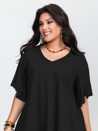 Asymmetrical Tassel Hem Plain Tunic